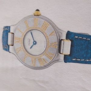 Beautiful Cartier must be Cartier watch. Blue leather band. See photos.